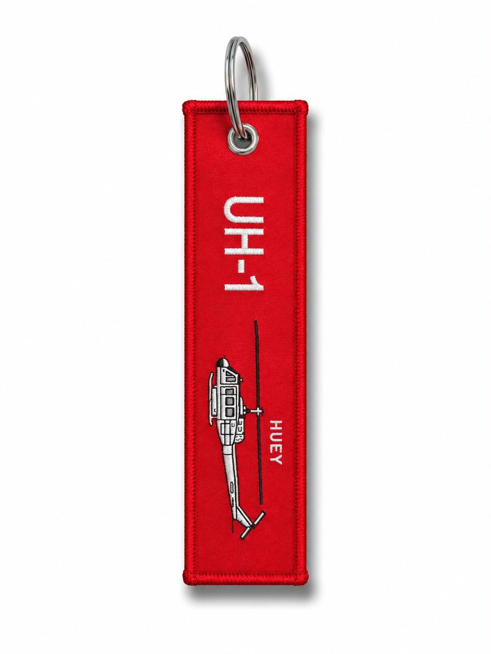 Kırmızı kumaş anahtarlık "UH-1H RBF" Pilot Shop Bakırköy, askeri helikopter temalı anahtarlık detaylarıyla.