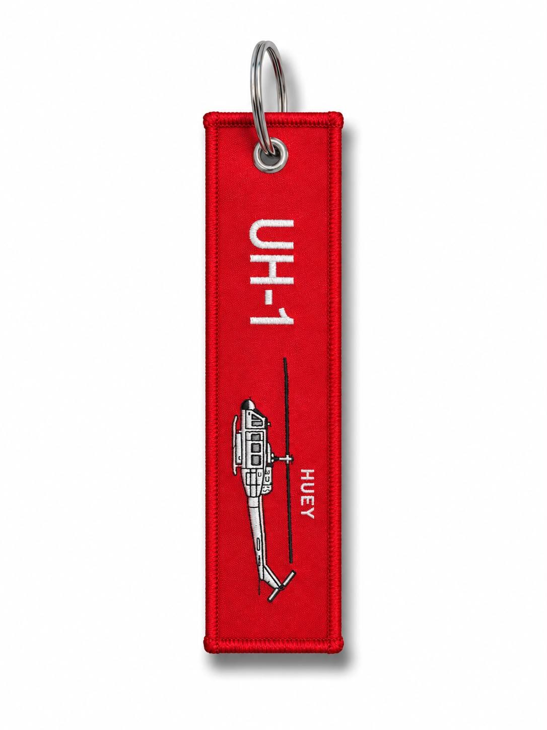 Kırmızı kumaş anahtarlık "UH-1H RBF" Pilot Shop Bakırköy, askeri helikopter temalı anahtarlık detaylarıyla.