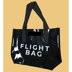Siyah PLAJ Çantası Flight Bag, şık ve pratik plaj aksesuarı, yan görünüm ve detaylar ile gösteriliyor.