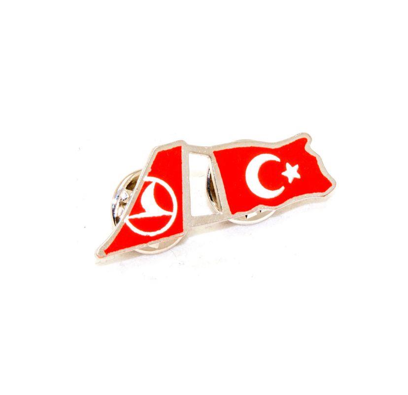İki renkli CrewTürk rozet ve bayrak pilottaki Türk ve TC bayrağı tasarımı, takı ve aksesuar olarak kullanılır.